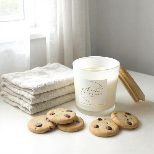 Aretii Choc Chip Cookie coconut wax candle in white glass jar with white label and bamboo lid.