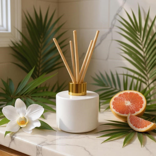 Aretii Tropical Breeze reed diffuser 120ml white glass bottle with gold collar and 5 reeds.